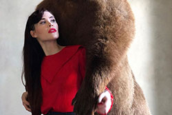 Taxidermist Leslie Williamson with stuffed bear