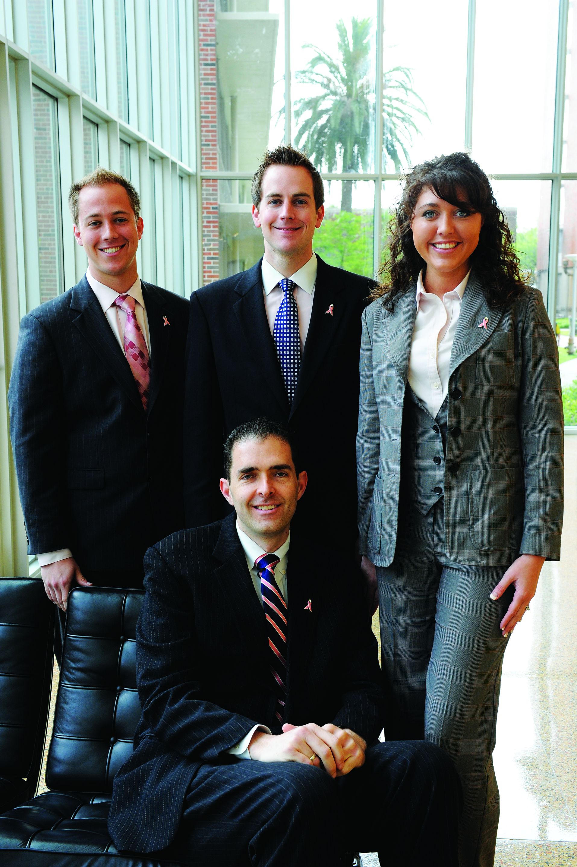 Tears for Life, a business started by a team of University of Arkansas students, won first place in the business innovation track. Standing, from left to right, are Jordan Greer, Jared Greer and Bessie Williams. Seated is Chris Elizer