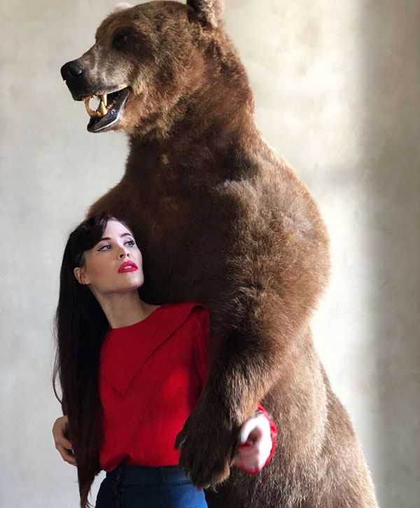 Leslie Dalton with stuffed grizzly bear