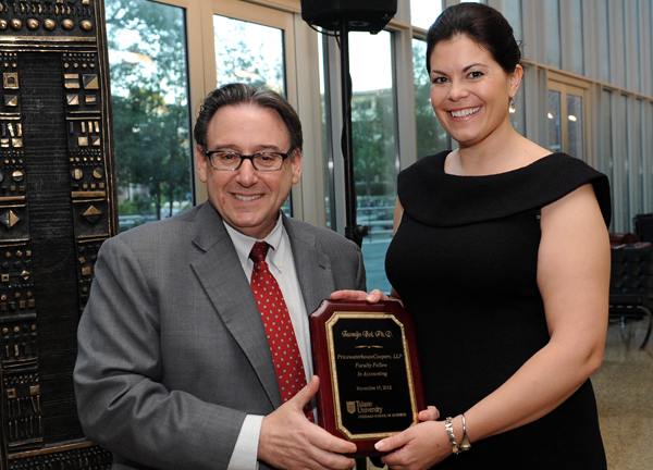 Bol invested as inaugural PwC Faculty Fellow
