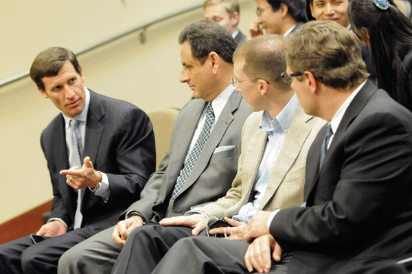 Judges for this year’s Rolanette and Berdon Lawrence Finance Case Competition included, left to right, John Raymond, Casey Herman, Chris Conoscenti and David Grzebinski.