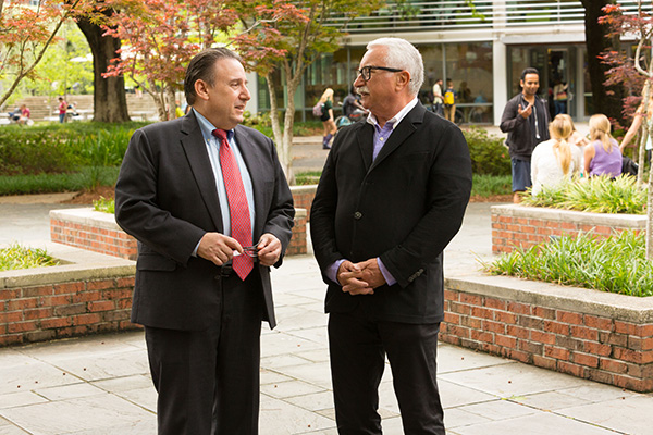Freeman School Dean Ira Solomon, left, talks with Lepage prior to this year's Tulane Business Model Competition. Solomon says Lepage's gift has the potential to transform entrepreneurial education at the Freeman School.