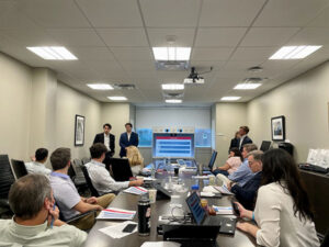 Freeman students presenting to Entergy executives