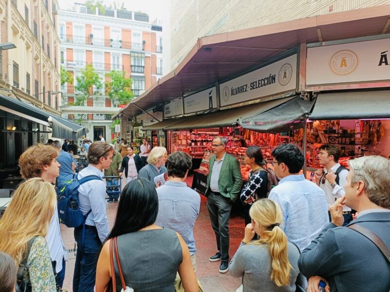 Students touring Mercado de la Paz in Madrid.