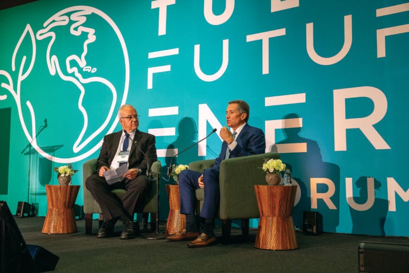 Dean Paulo Goes interviews Jim Burke on a stage at the Tulane Future of Energy Forum