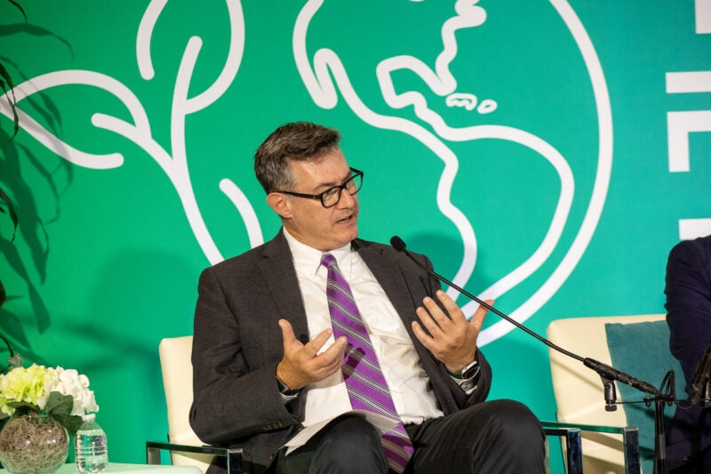 Daniel Shantz photographed on stage at the Tulane Future of Energy Forum