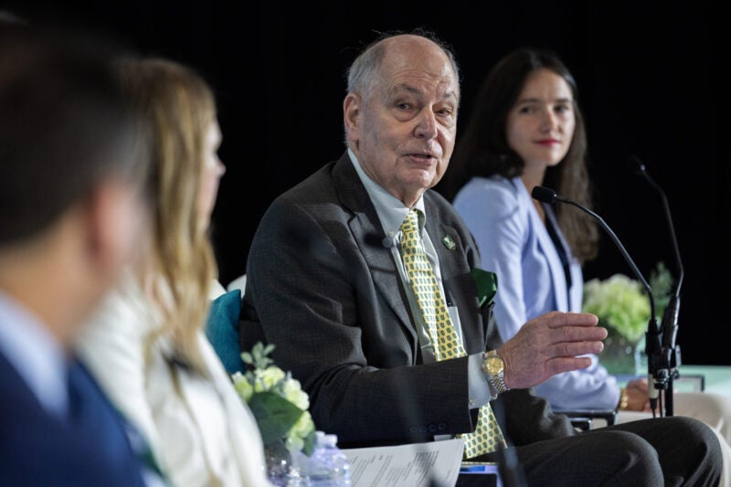 Eric Smith moderates a panel at the Tulane Future of Energy Forum